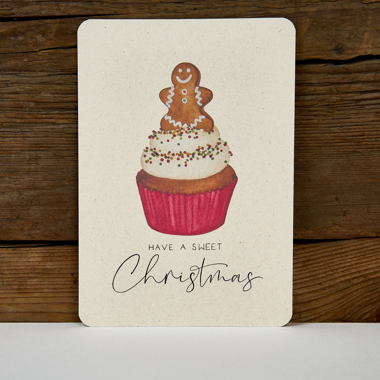 Postkarte aus Zuckerrohrpapier mit dem Motiv Lebkuchen Cupcake